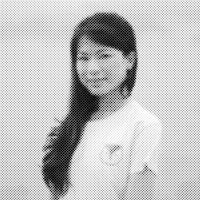 a black and white photo of a woman in a white shirt